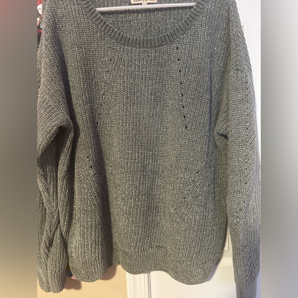 Serpentine knit sweater